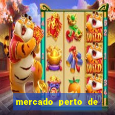 mercado perto de mim open now